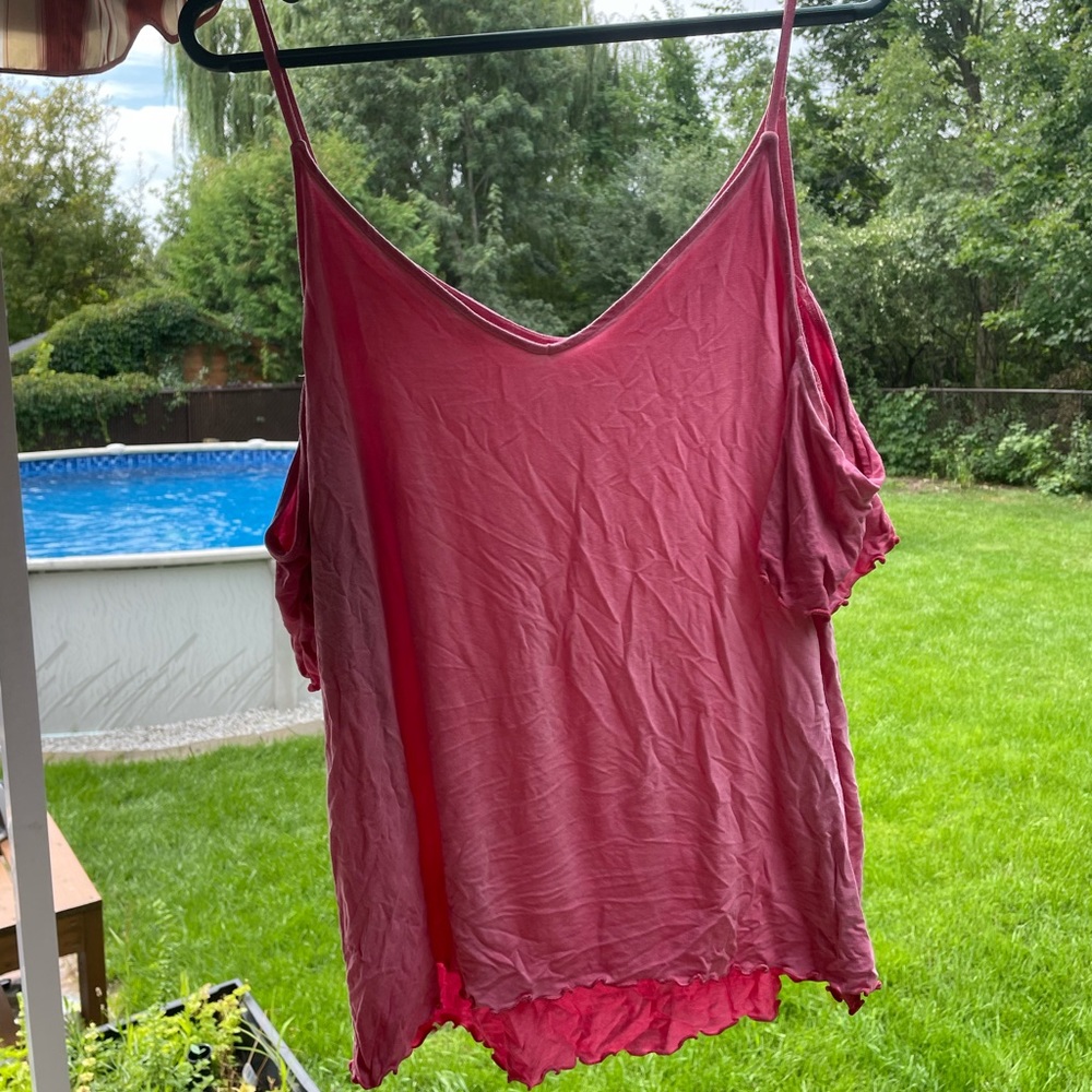 Pink camisole with arm straps